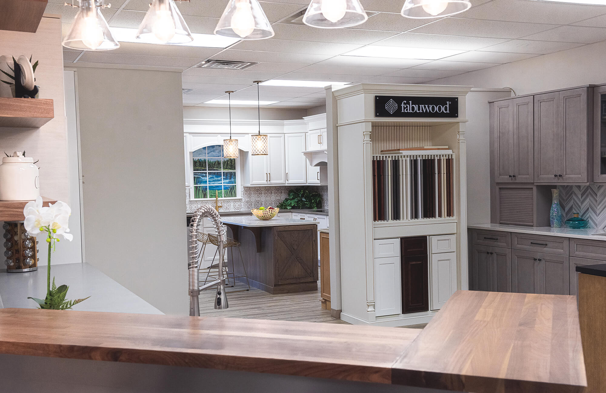 Showroom kitchen with bowl of fruit on the table