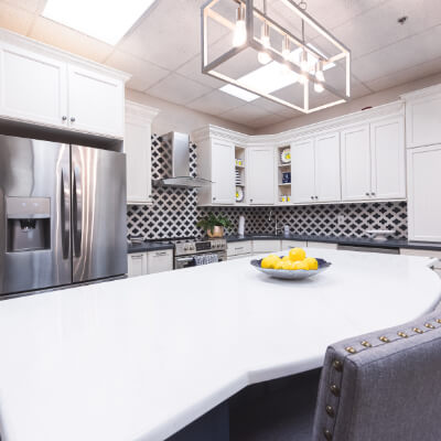 Large bright white and black showroom kitchen thumbnail